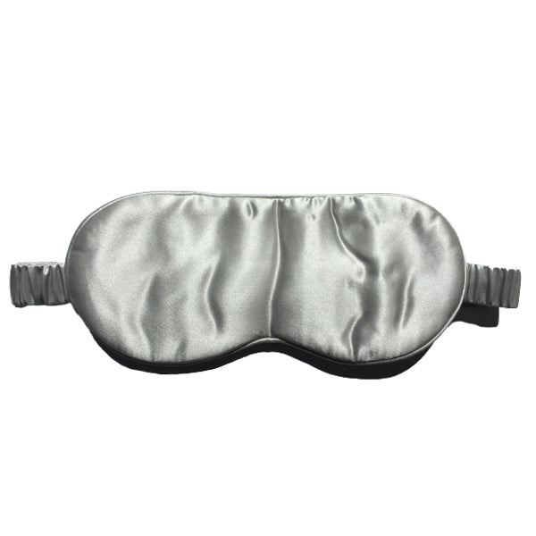 Silver silk eye mask from Monday Silks, offering a smooth, hydrating sleep experience. Made with premium mulberry silk.
