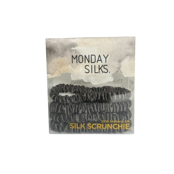 Pack of silk scrunchies with 'Monday Silks' branding on a white background