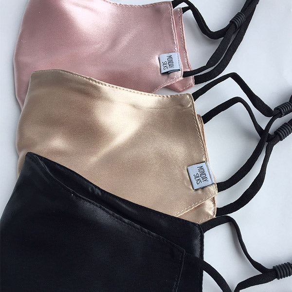 Set of three Silk Face Masks - Anti Irritating & Breathable | Monday Silks NZ in black, champagne, and pink. Soft, hypoallergenic and reusable.