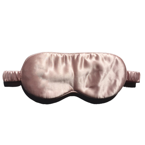 Pink silk eye mask by Monday Silks, crafted for gentle skin contact and luxurious sleep. Made from 100% mulberry silk.