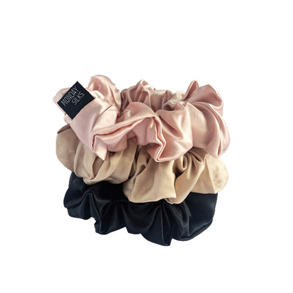 Pack of midi silk scrunchies in pink, Champagne and black. Silk scrunchie eliminate knots and tangles on removal. 